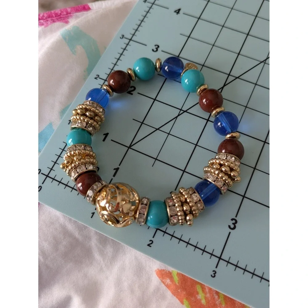 Graziano Stretch Bracelet In Gold Tone & Turquoise Colors Filagree Ball Chunky